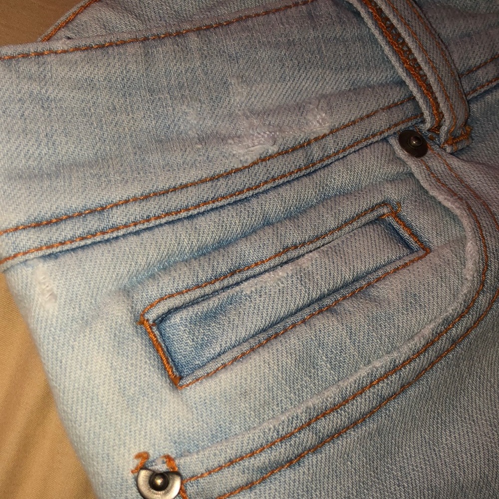 light blue capris with rips on legs - Picture 3 of 6